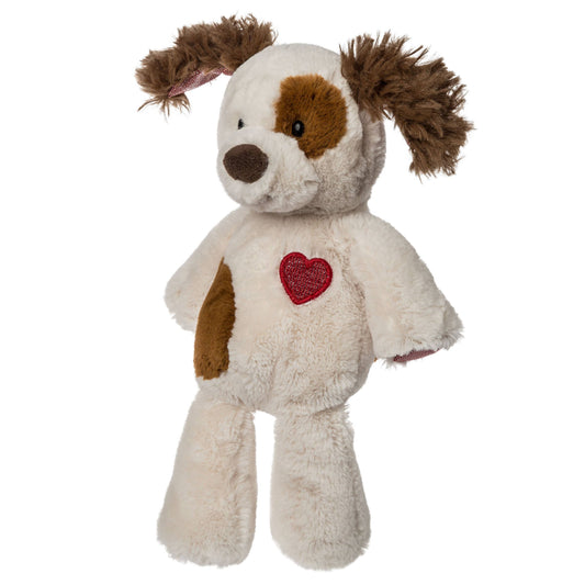 The Mary Meyer Marshmallow Junior Sweet Pea Puppy is a plush toy dog with floppy brown ears, brown spots, and a red heart patch on its chest, made from soft Marshmallow Zoo fabric and shown upright against a white background.