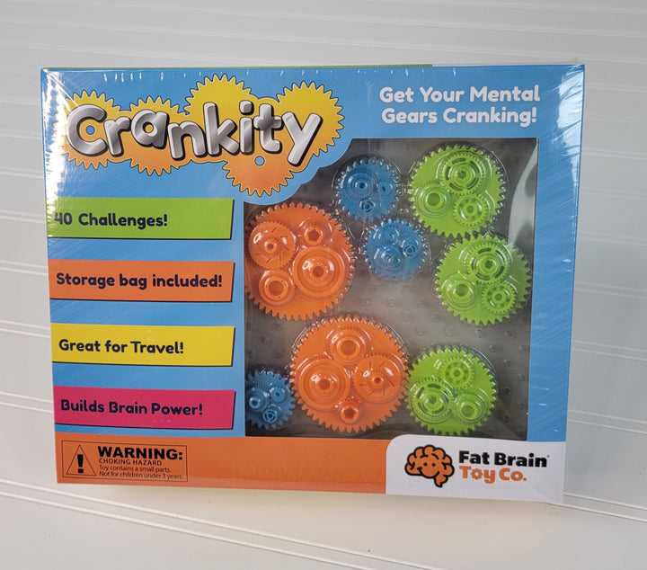 The Crankity Gear Toy by Fat Brain Toys features orange, blue, and green gears, 40 challenges, a storage bag, and brain-building fun—ideal for independent play or travel.