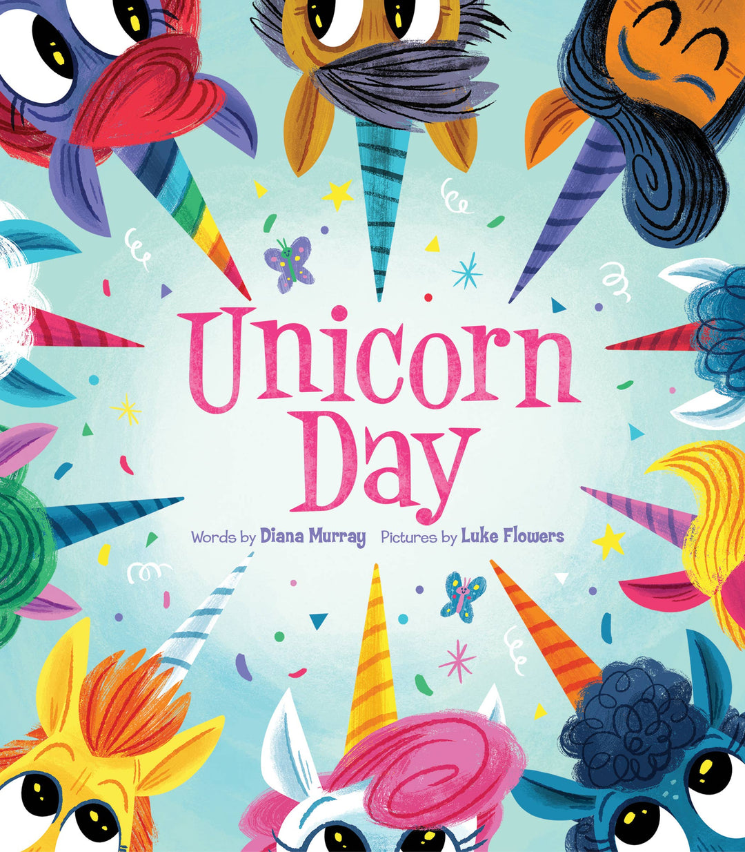 The board book Unicorn Day by Sourcebooks features a colorful illustrated cover with eight whimsical unicorn faces in various colors and expressions around the pink title on a light blue background, accented by confetti and stars.