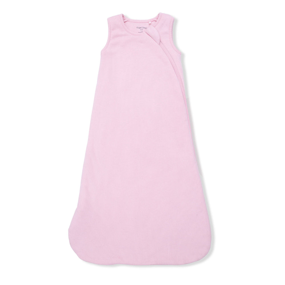 The Angel Dear Solid Romance Rose Rib Sleep Bag, a sleeveless and light pink baby sack with soft ribbed modal fabric, side zipper, and rounded bottom, is shown laid flat on a white background.