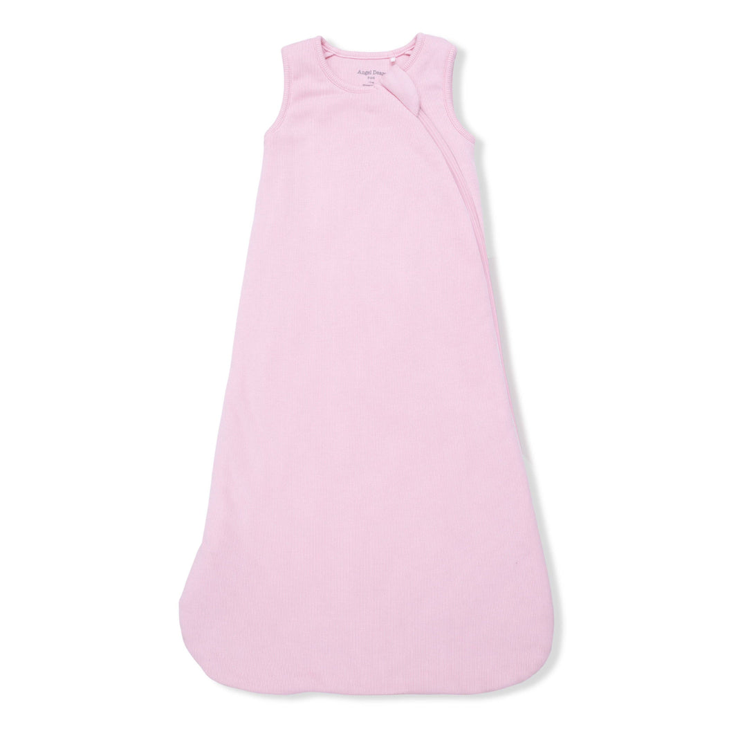 The Angel Dear Solid Romance Rose Rib Sleep Bag, a sleeveless and light pink baby sack with soft ribbed modal fabric, side zipper, and rounded bottom, is shown laid flat on a white background.
