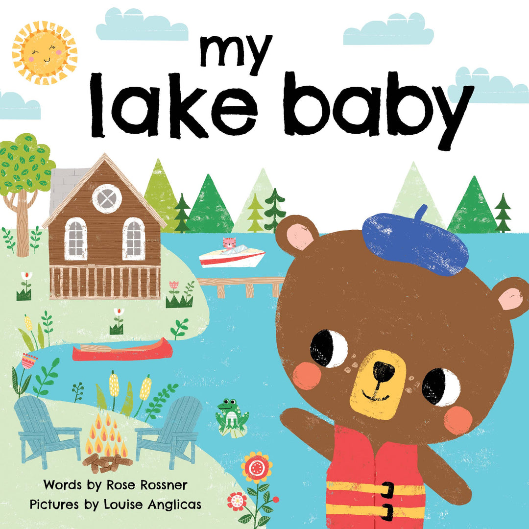 The cover of My Lake Baby (board book) by Sourcebooks features a smiling bear in a life jacket by a lake, with a cabin, dock, boats, campfire, and trees in the background under a sunny sky.