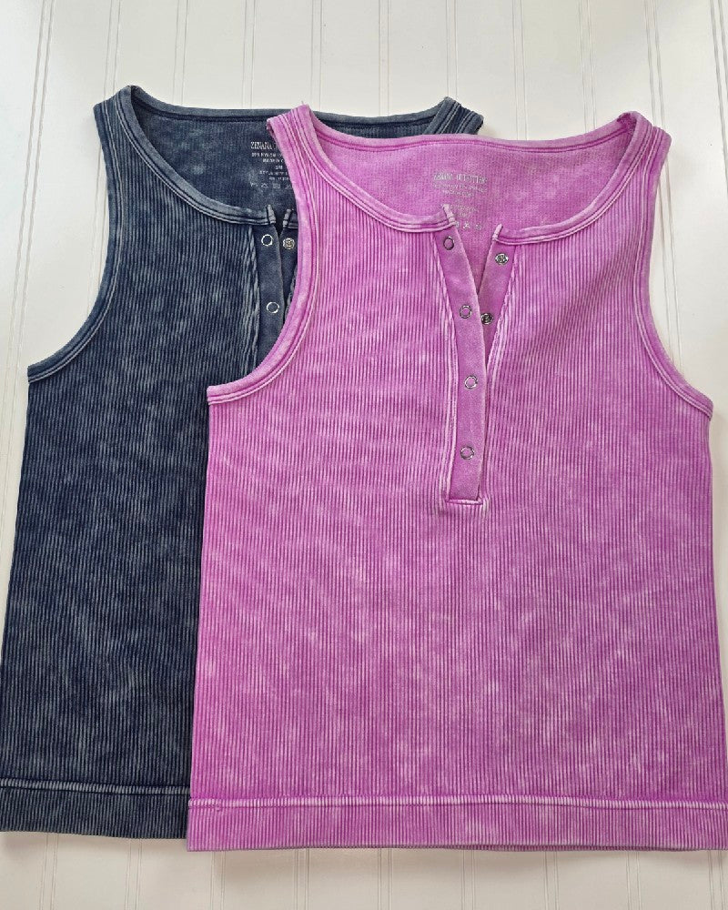 The two color options in the Anja Washed ribbed tank top: Navy and Mauve. Both tanks have a Henley neckline. 