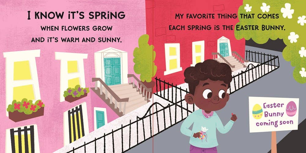 A child holds a bag on a lively street with flowers and bright houses. A sign reads Easter Bunny coming soon. Spring is warm, sunny—perfect for gifting Sourcebooks' My First How to Catch The Easter Bunny (BB) as an Easter basket stuffer!.