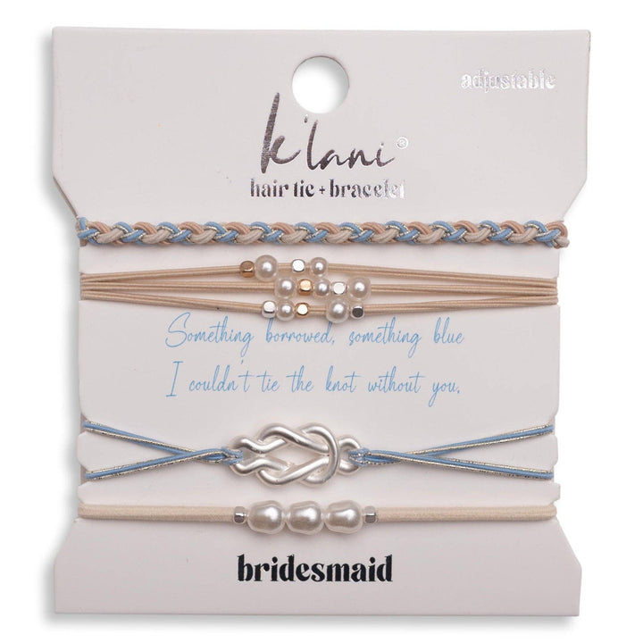 A set of four K’lani “Bridesmaid” cream and blue adjustable hair tie bracelets with pearl accents makes a thoughtful bridesmaid gift, each presented on a card reading “Something borrowed, something blue. I couldn’t tie the knot without you.”.