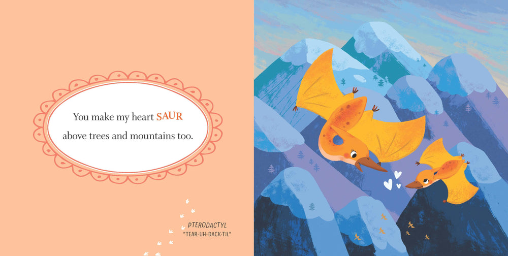 The card from Sourcebooks’ *I Love You More, Babysaur* features two orange pterodactyls soaring over snowy mountains and hearts, with the message: “You make my heart SAUR above trees and mountains too”—a charming Valentine’s Day book for kids or an adorable dinosaur story for babies.